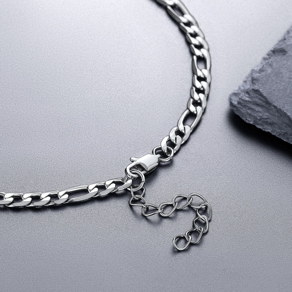 Close-up of black custom nameplate necklace