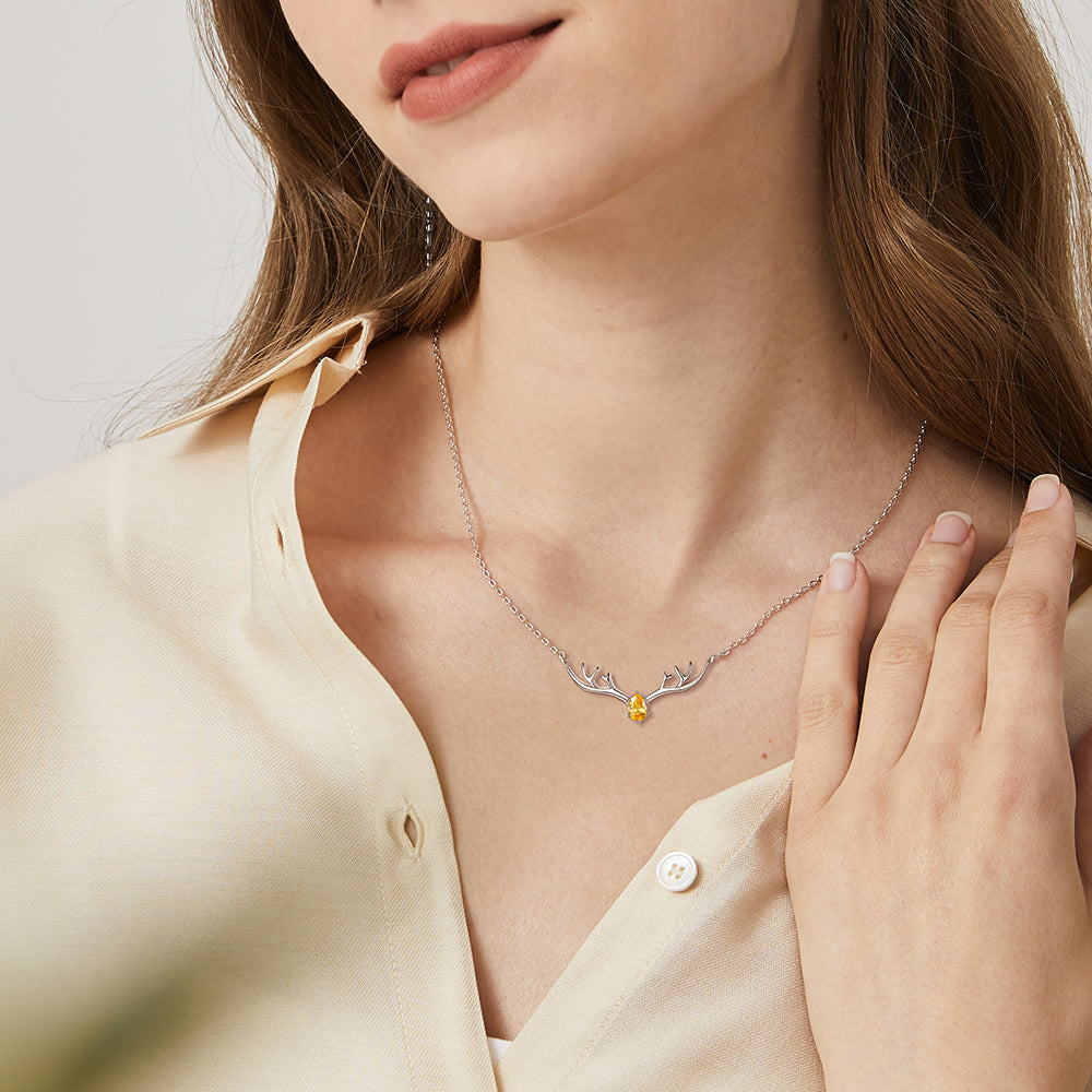 Woman Wearing November Birthstone Antler Necklace