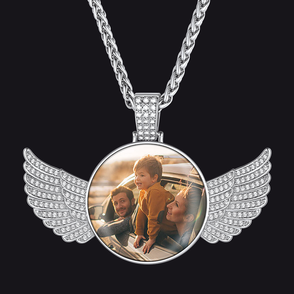 Winged necklace with a circular pendant showing a family photo