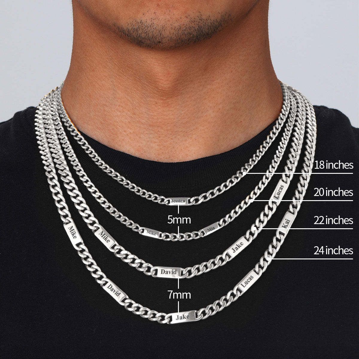 Silver chain necklaces with measurement labels on a black background