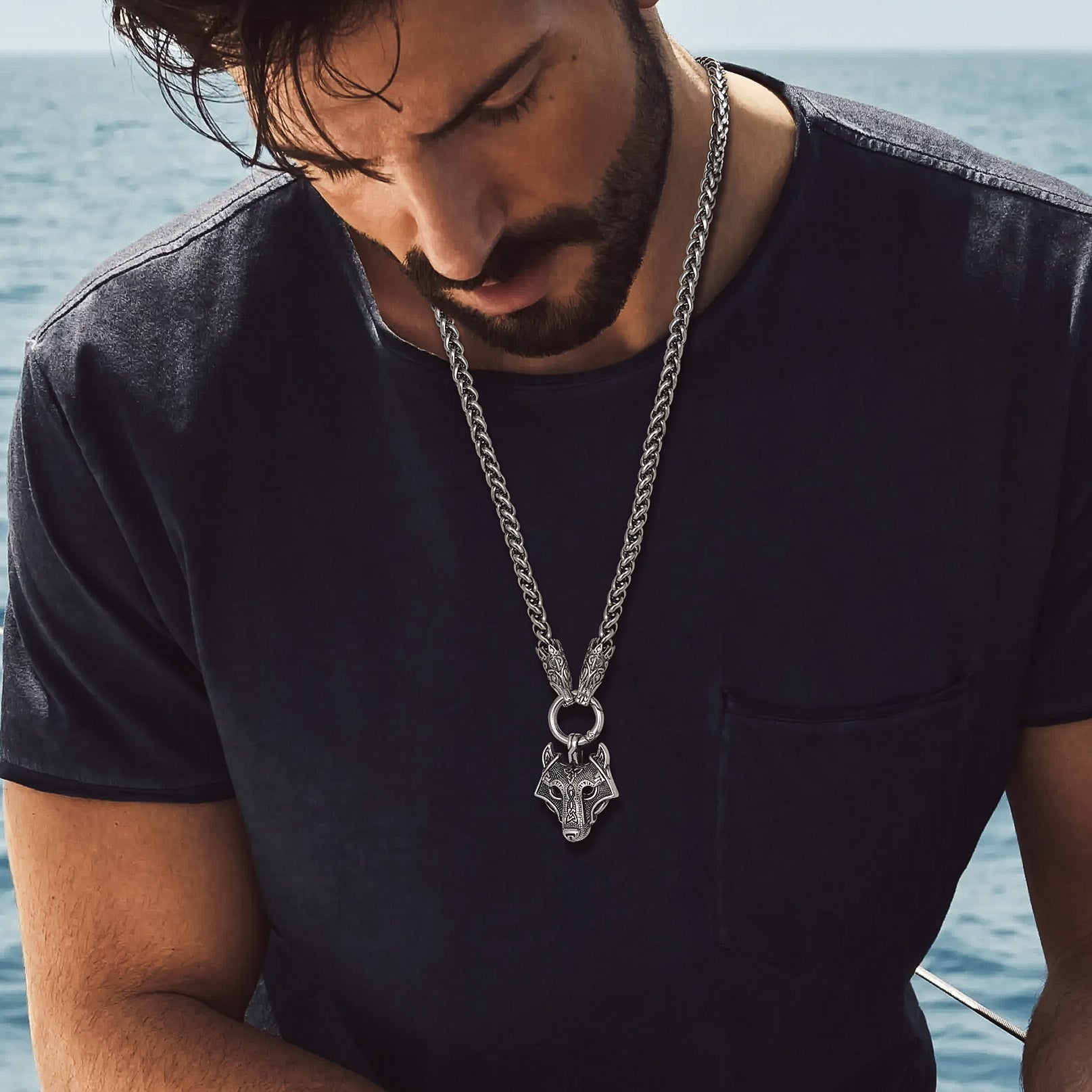 Man wearing Viking Wolf Pendant Necklace with wolf head pendant