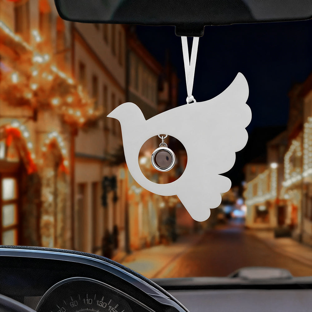 Holiday decoration with dove-shaped projection and photo