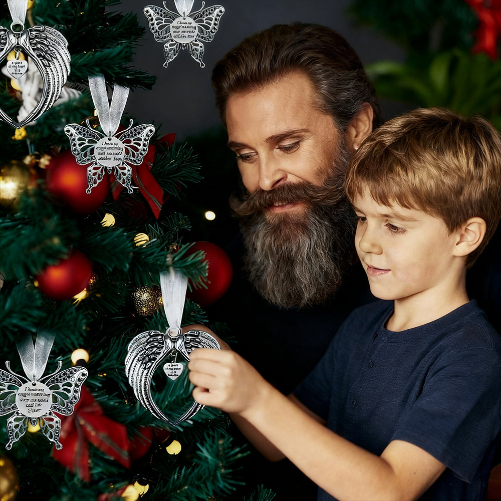 Man and child looking at a Christmas tree with ornaments.