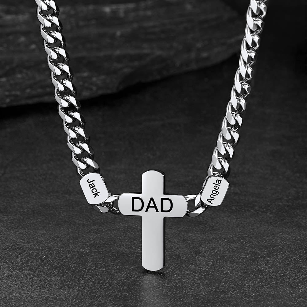 Silver necklace with a cross pendant and engraved names