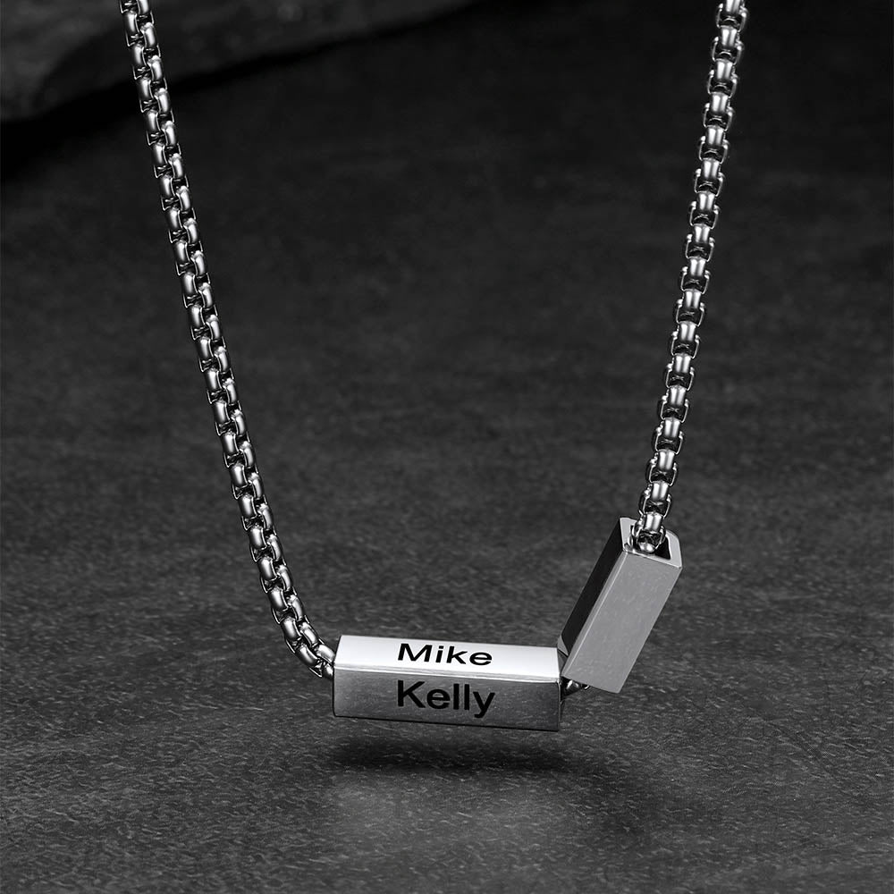 Close-up of engraved name bars on Cuban chain in stainless steel