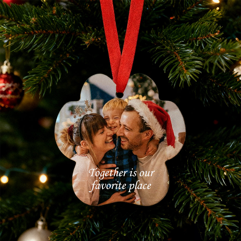 Personalized Christmas ornament with a family photo and 'Together is our favorite place' text, hanging on a Christmas tree.
