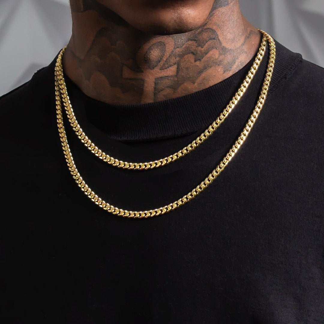 Male model wearing 5mm width Miami Cuban link two-chain necklace set