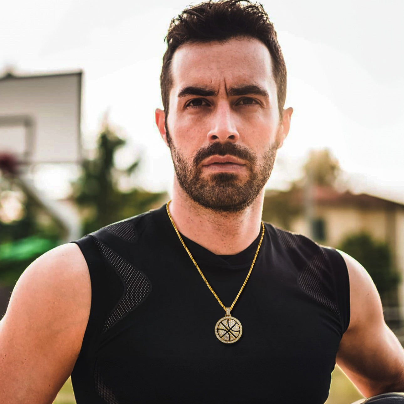 Man wearing a Bling Basketball Spinner Necklace