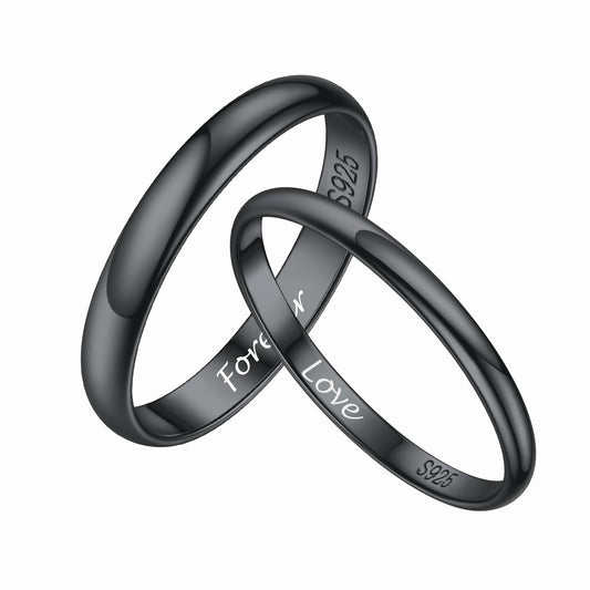 S925 silver black couple rings  with 'Love' engraving on a white backgroundimg