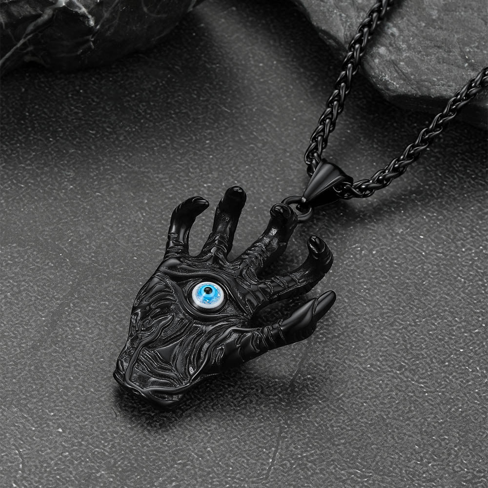 Black dragon claw necklace with blue evil eye