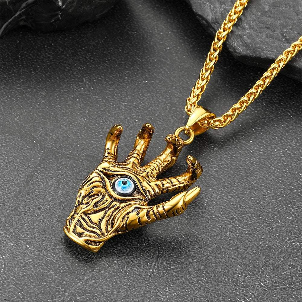 Gold dragon claw necklace with blue evil eye pendant