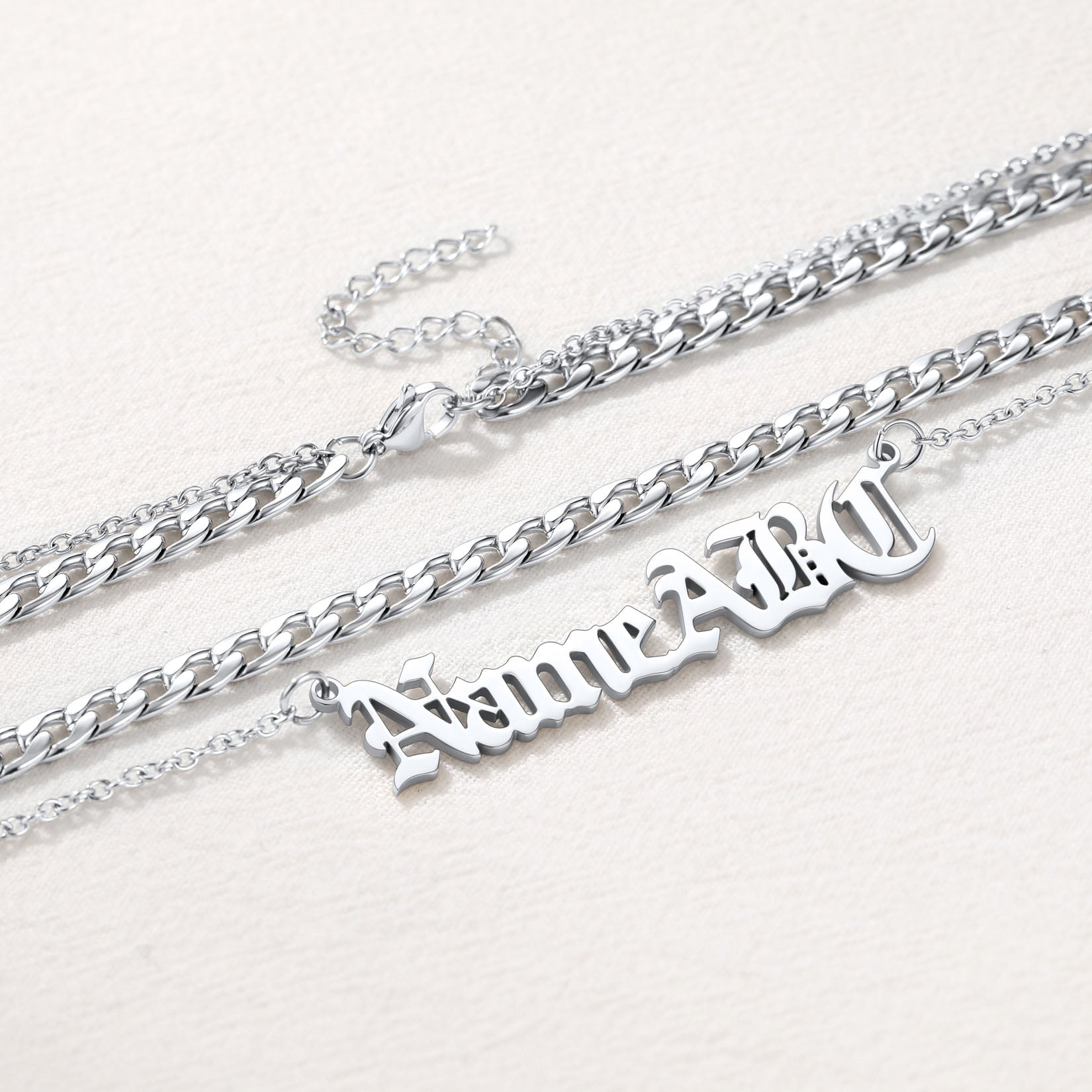 Close-Up of Steel Cuban Chain with Engraved Name Necklace – Custom Layered Set