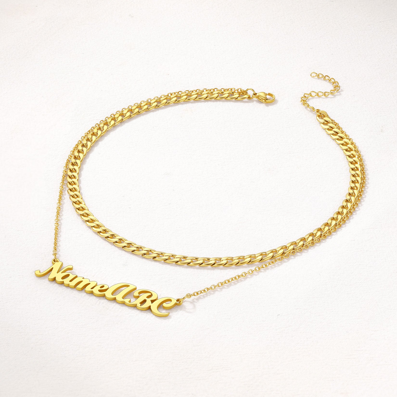 Detail of Gold Personalized Name Necklace Layered with Chunky Cuban Chain