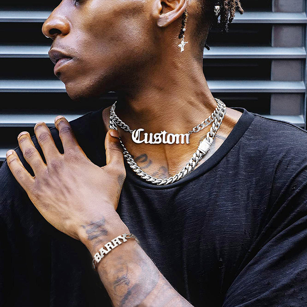 Male model wearing steel custom nameplate chain set
