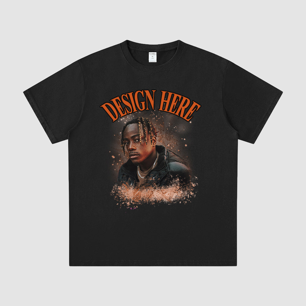 Black t-shirt with a graphic of a person and 'Design Here' text on a gray background