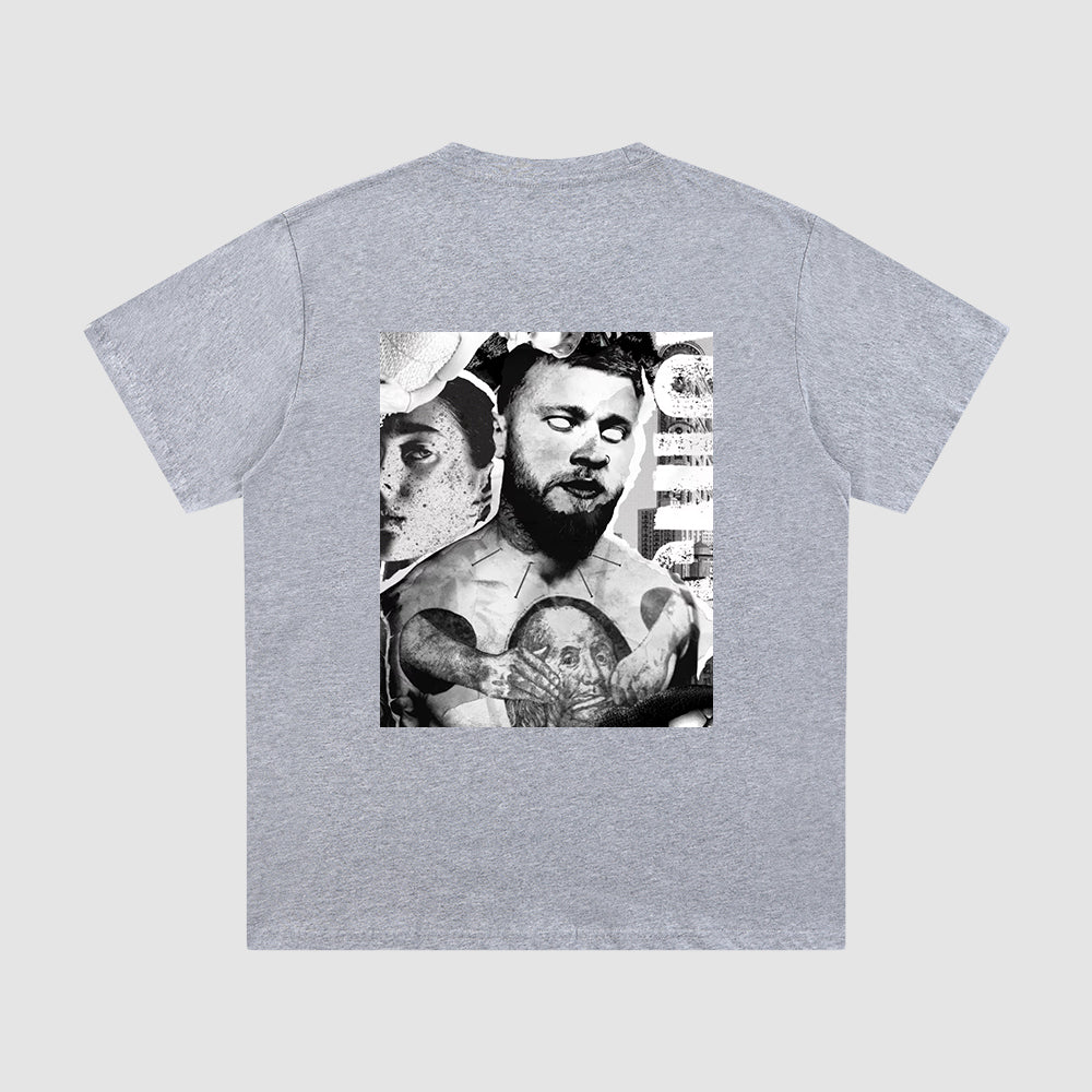 Gray t-shirt with a graphic design on the back featuring a tattooed person.