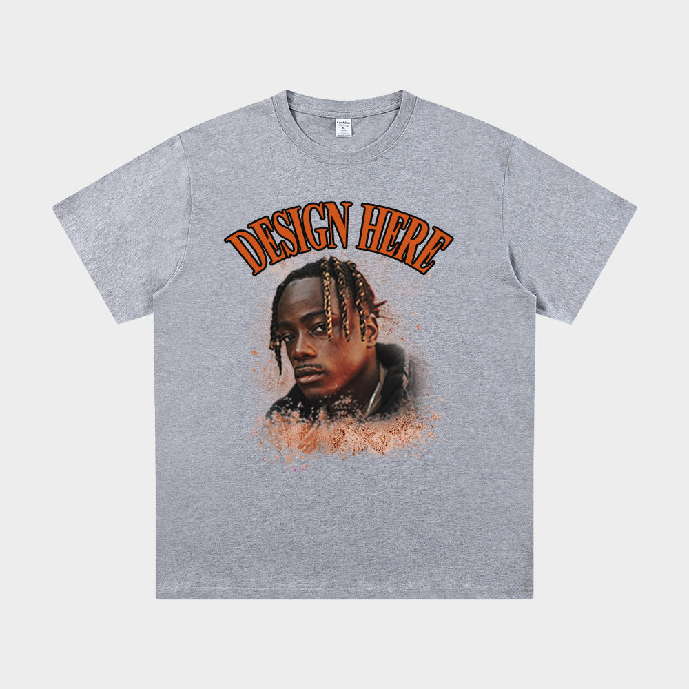 Gray t-shirt with a graphic of a person and 'Design Here' text on a white background