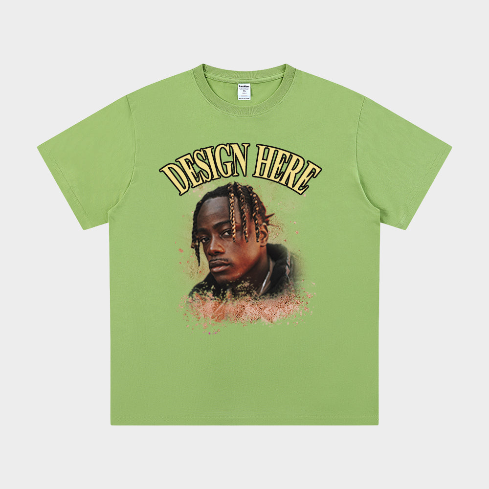 Green t-shirt with a graphic of a person and 'Design Here' text on a white background