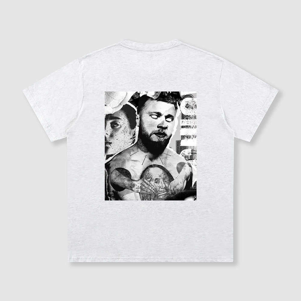 White t-shirt with black and white graphic design on a light gray background