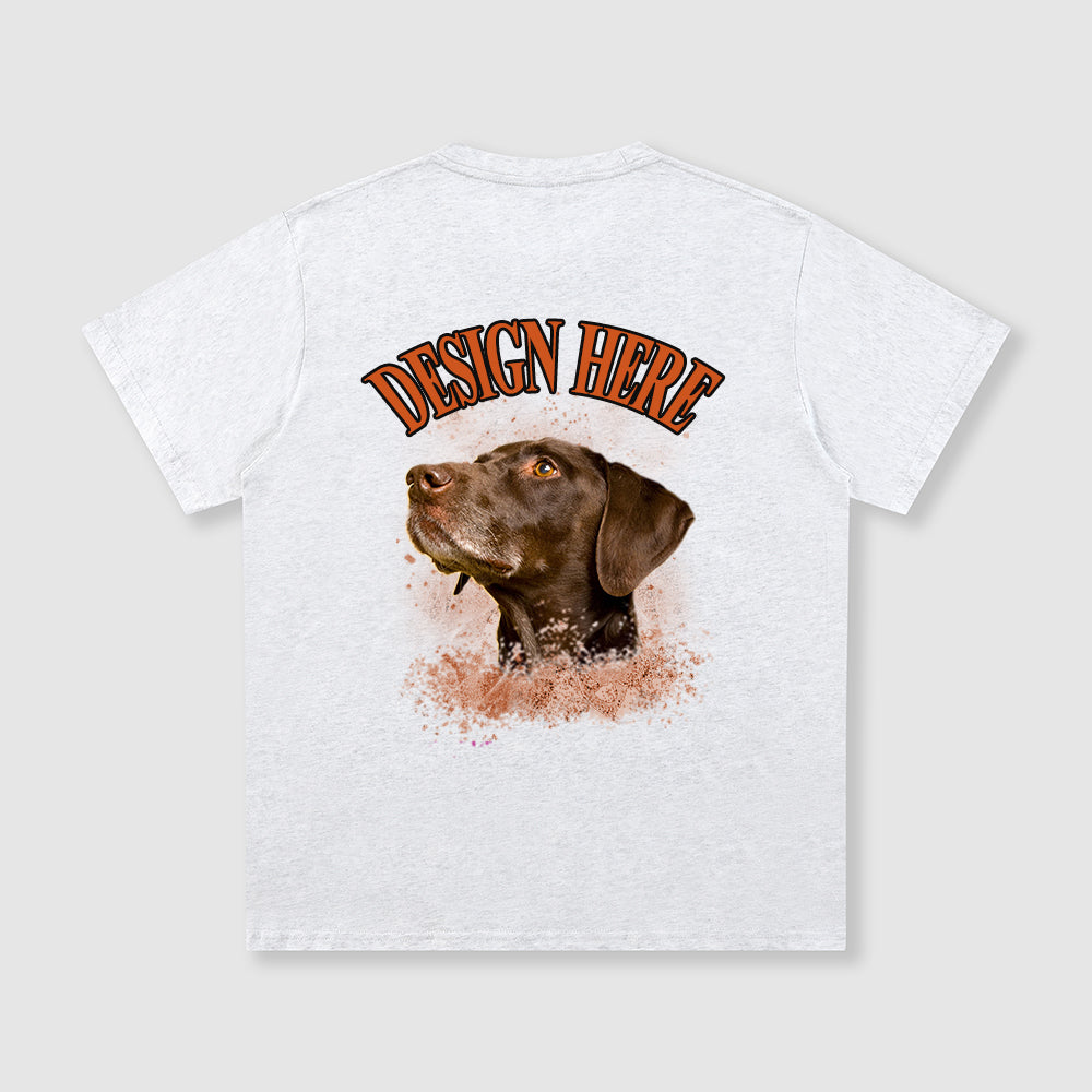 White t-shirt with a dog graphic and 'Design Here' text on a gray background