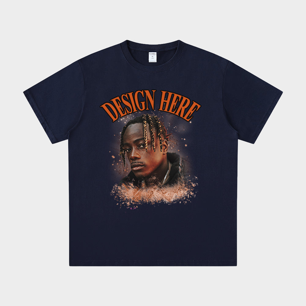 Navy blue t-shirt with a graphic of a person and 'Design Here' text on a white background