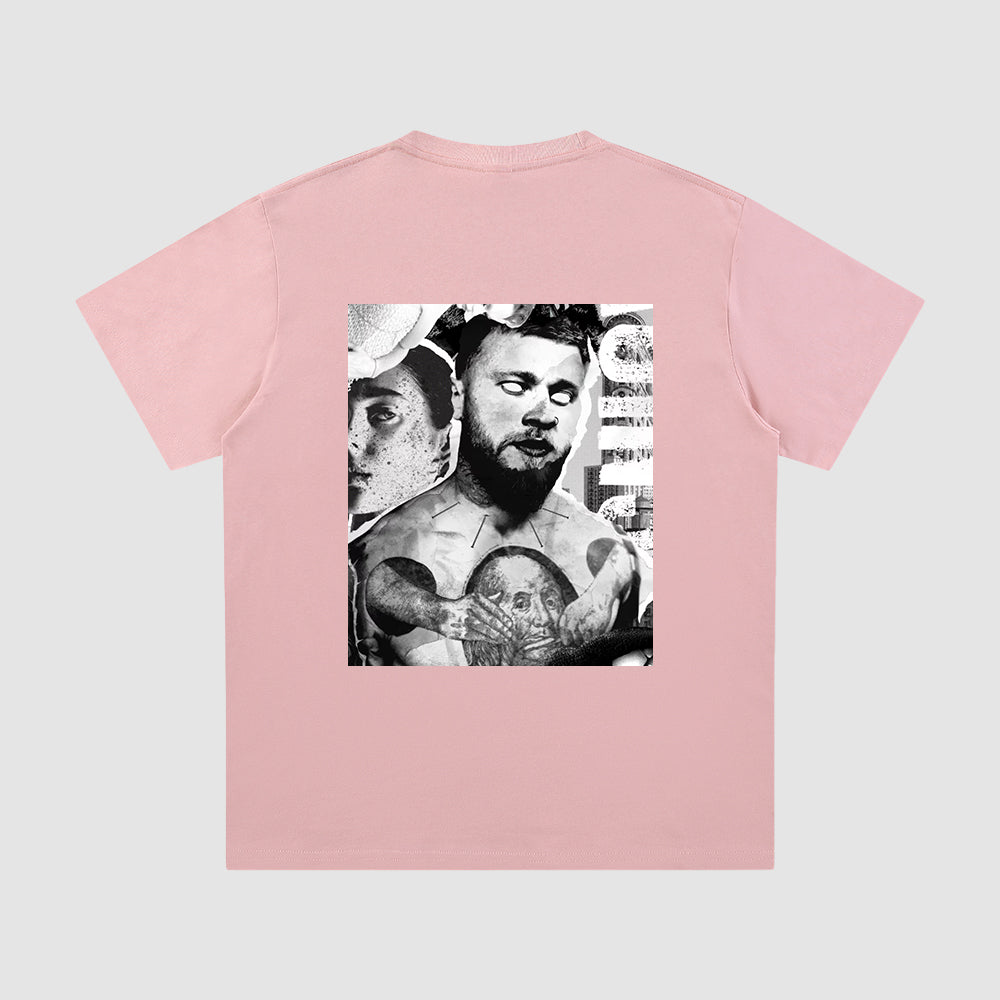 Pink t-shirt with a graphic design on the back against a light gray background