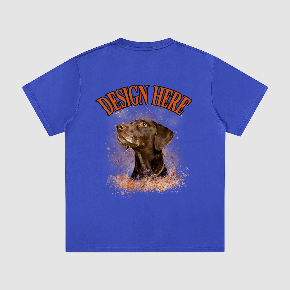 Blue t-shirt with a dog graphic and 'Design Here' text on a gray background