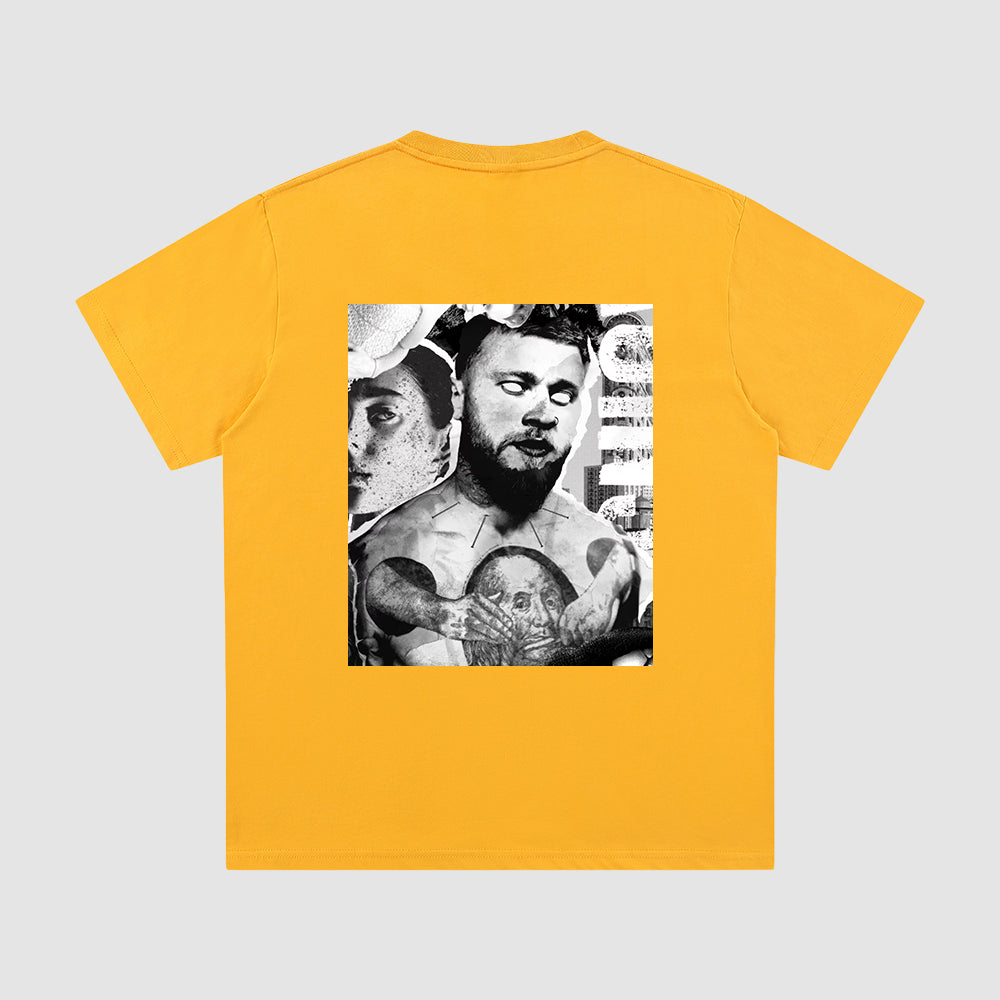 Yellow t-shirt with a black and white graphic on the back against a light gray background