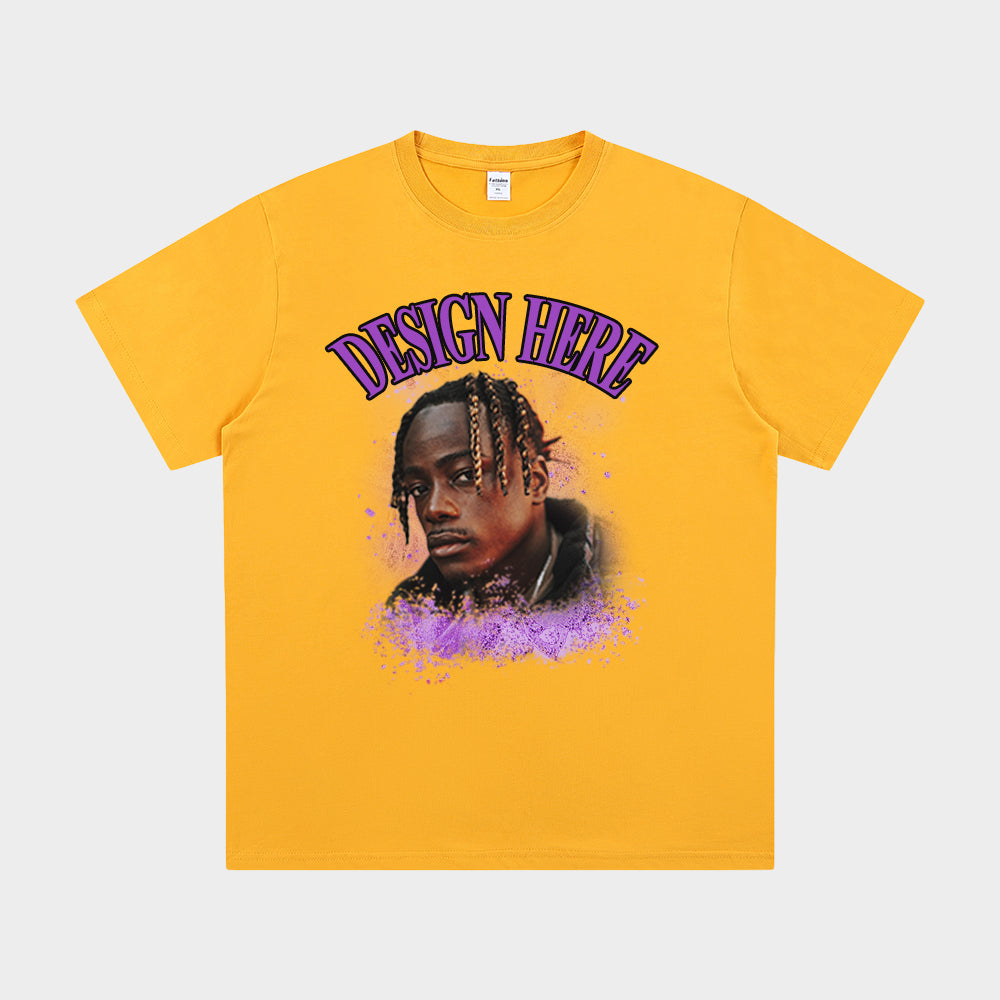 Yellow t-shirt with a graphic of a person and 'Design Here' text on a white background