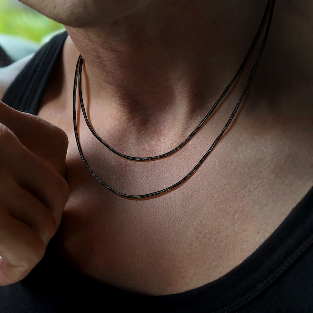 2mm thin snake chain layered necklace on male model