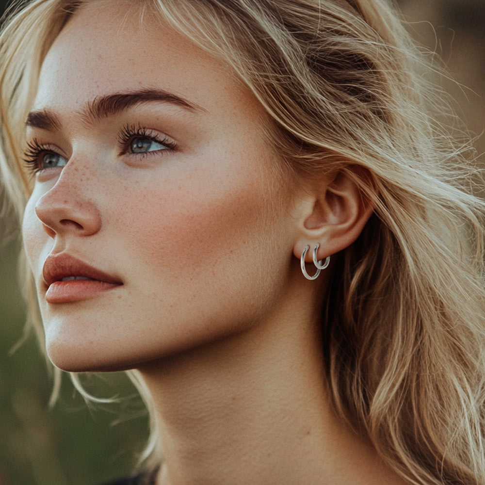 Woman Wearing 14&20mm Silver Huggie Hoop Earrings