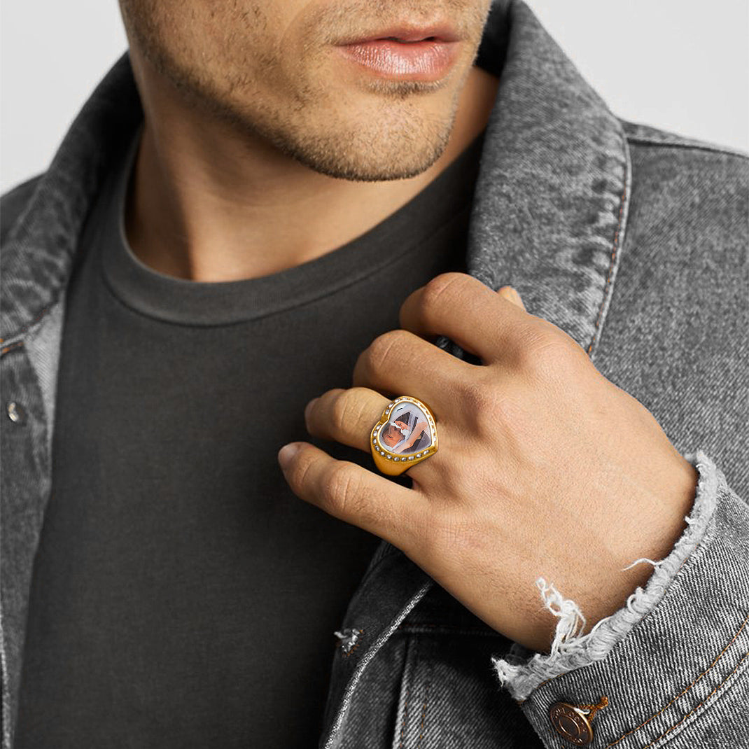Custom heart photo signet ring on a man's hand