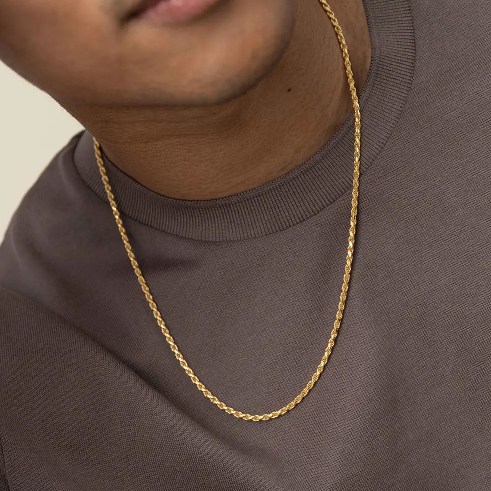 Gold rope chain necklace for men, close up detail
