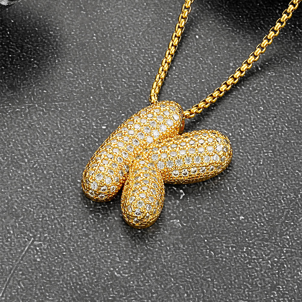 Close-up of cubic zirconia on initial pendant