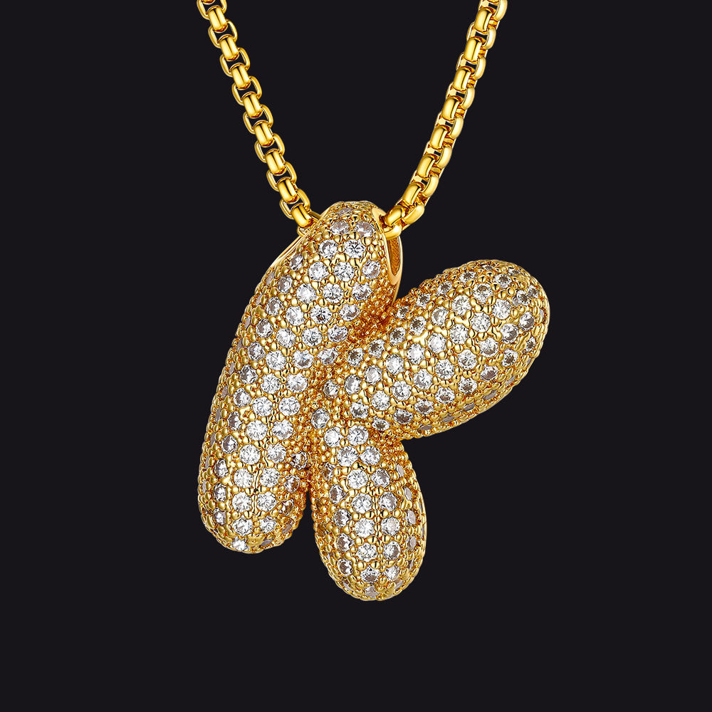 Elegant gold K initial necklace with sparkling detail