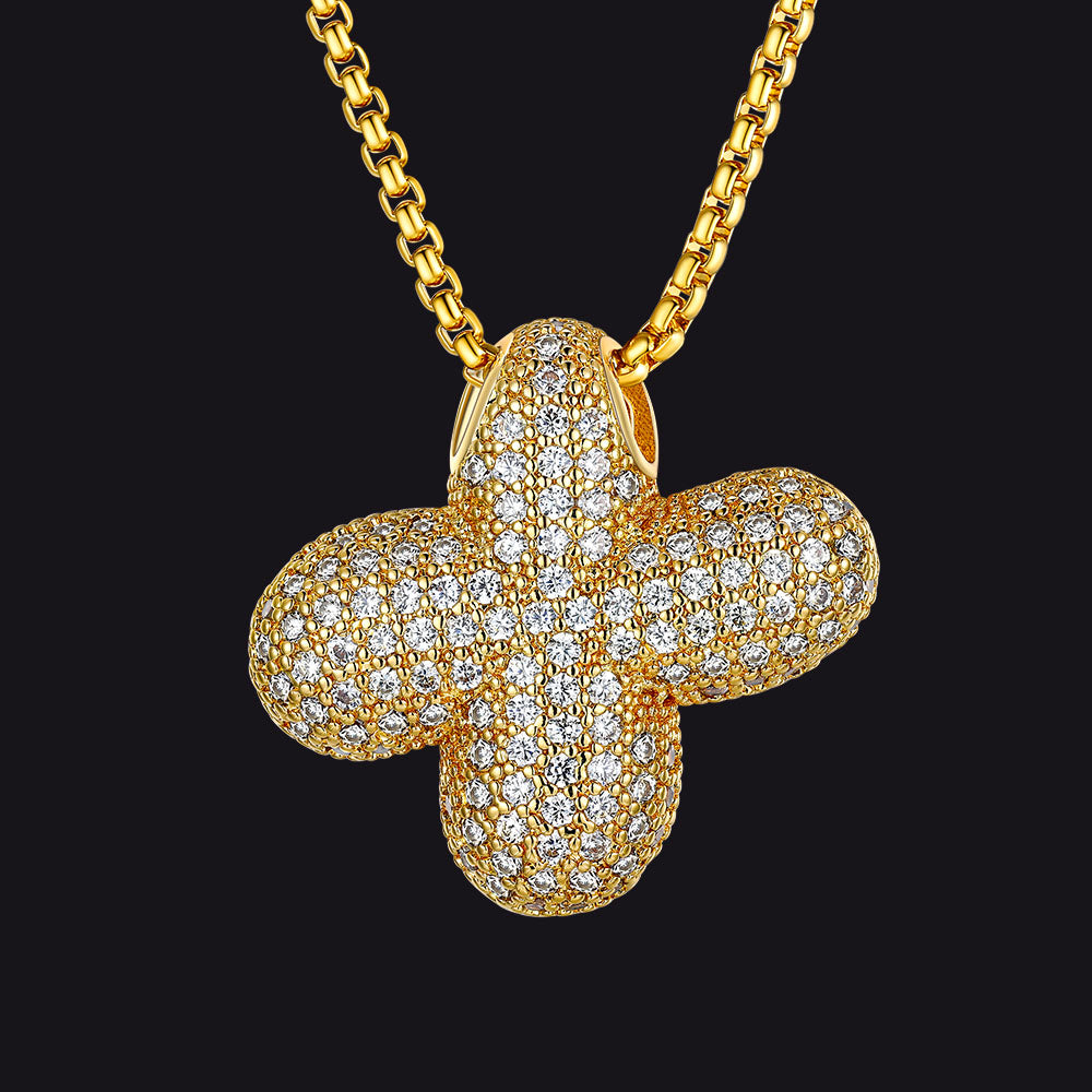 Modern X letter pendant in gold with CZ stone