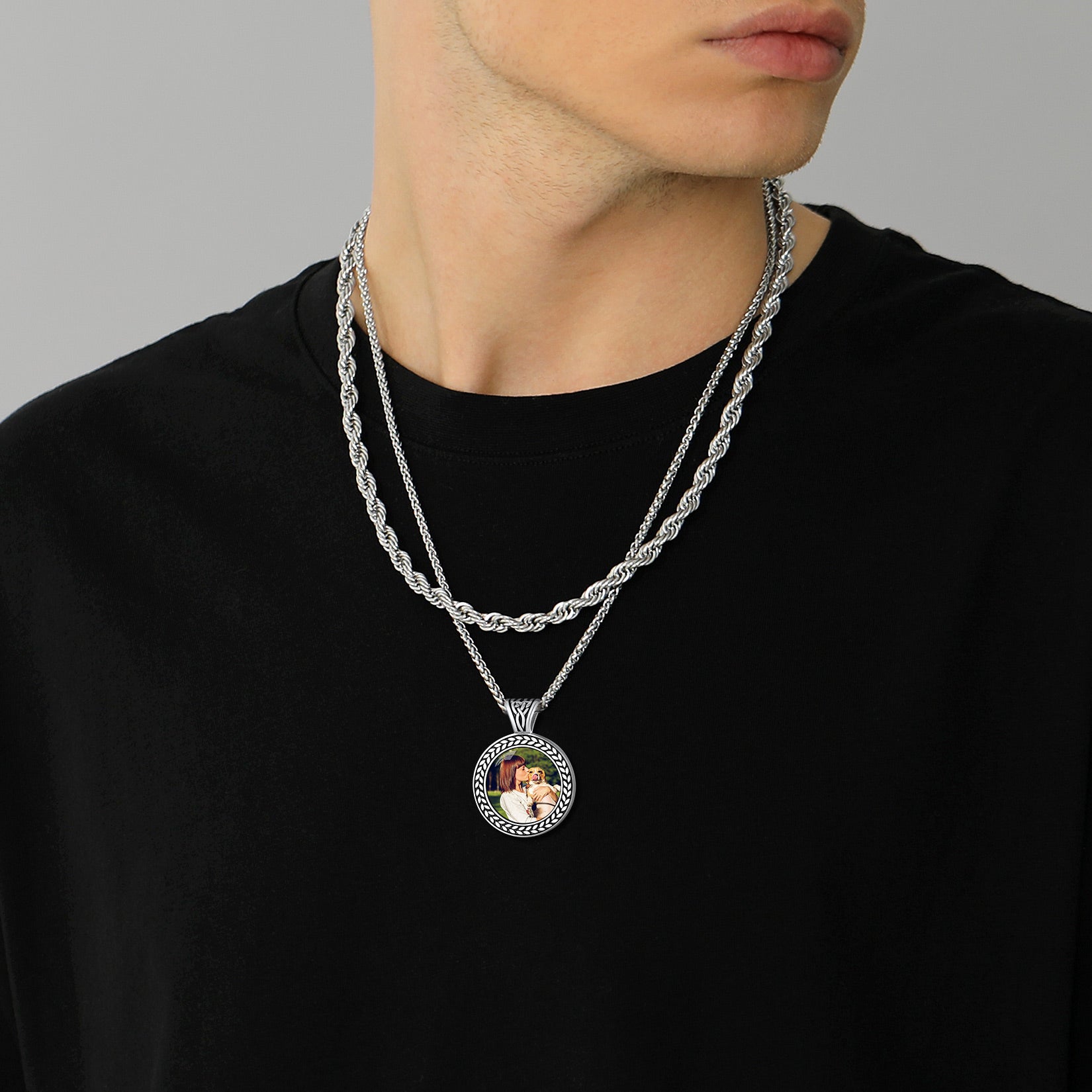 Man wearing a personalized photo pendant necklace