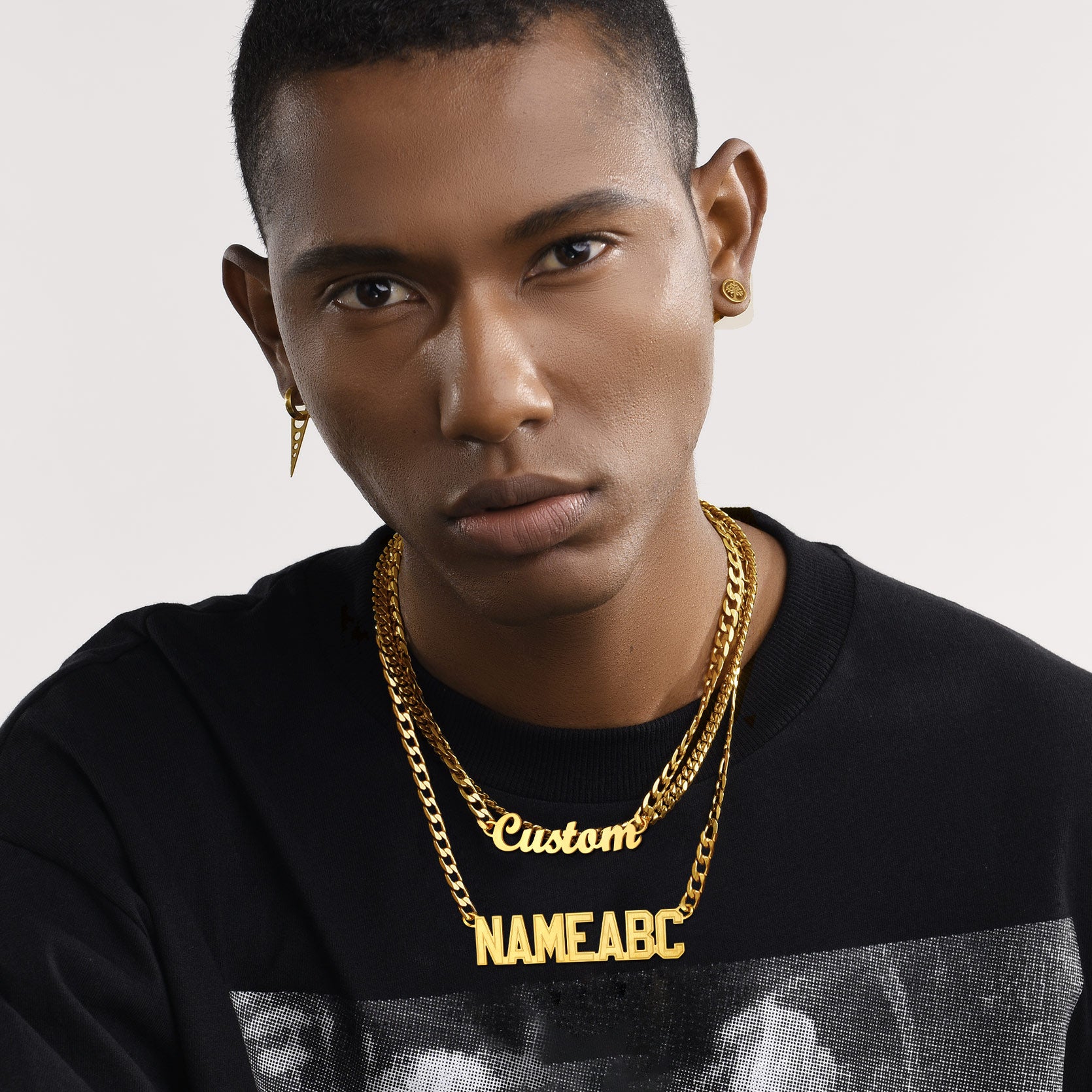 Man wearing personalized gold Cuban chain necklaces, NAMEABC and Custom