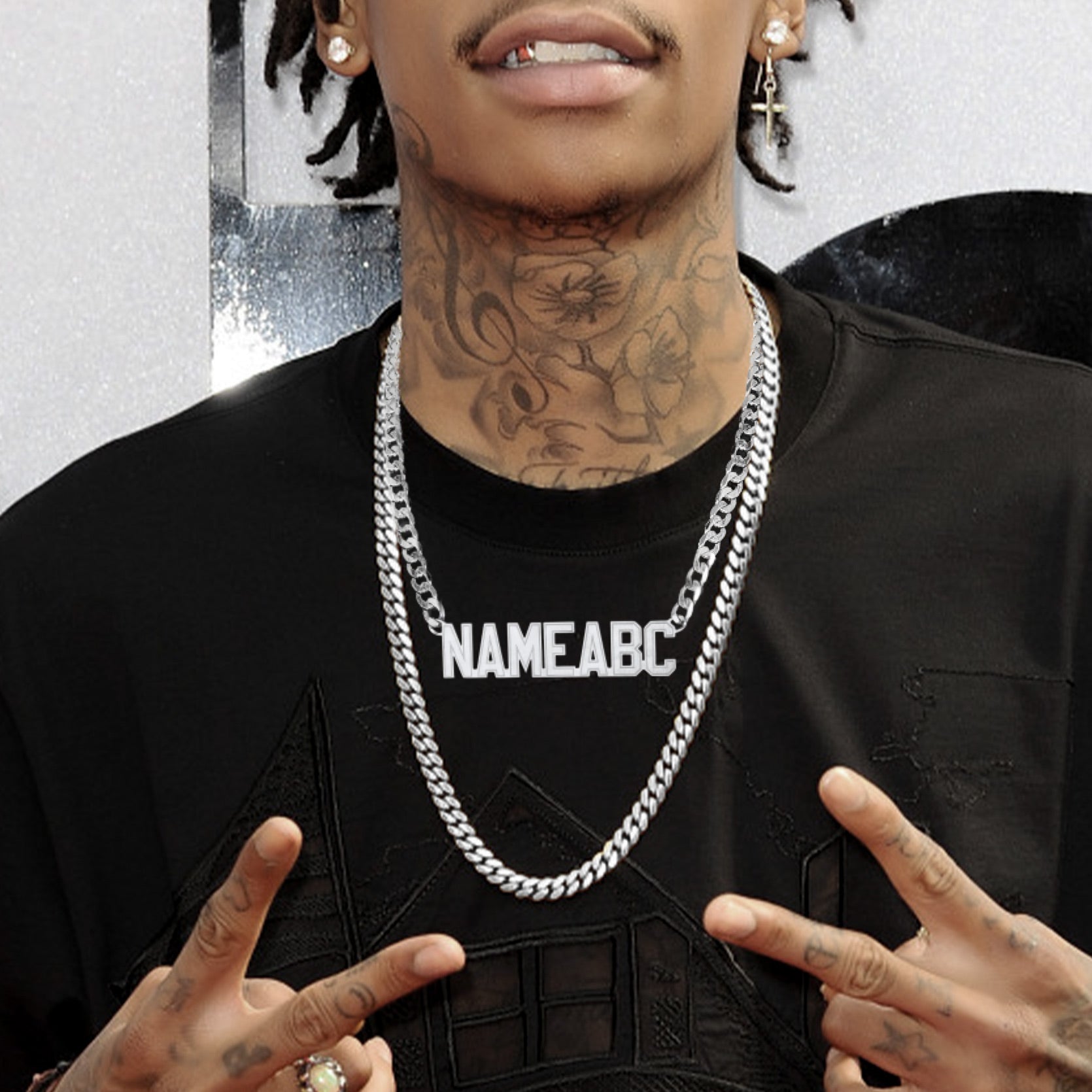 Man wearing a personalized Cuban chain necklace, NAMEABC