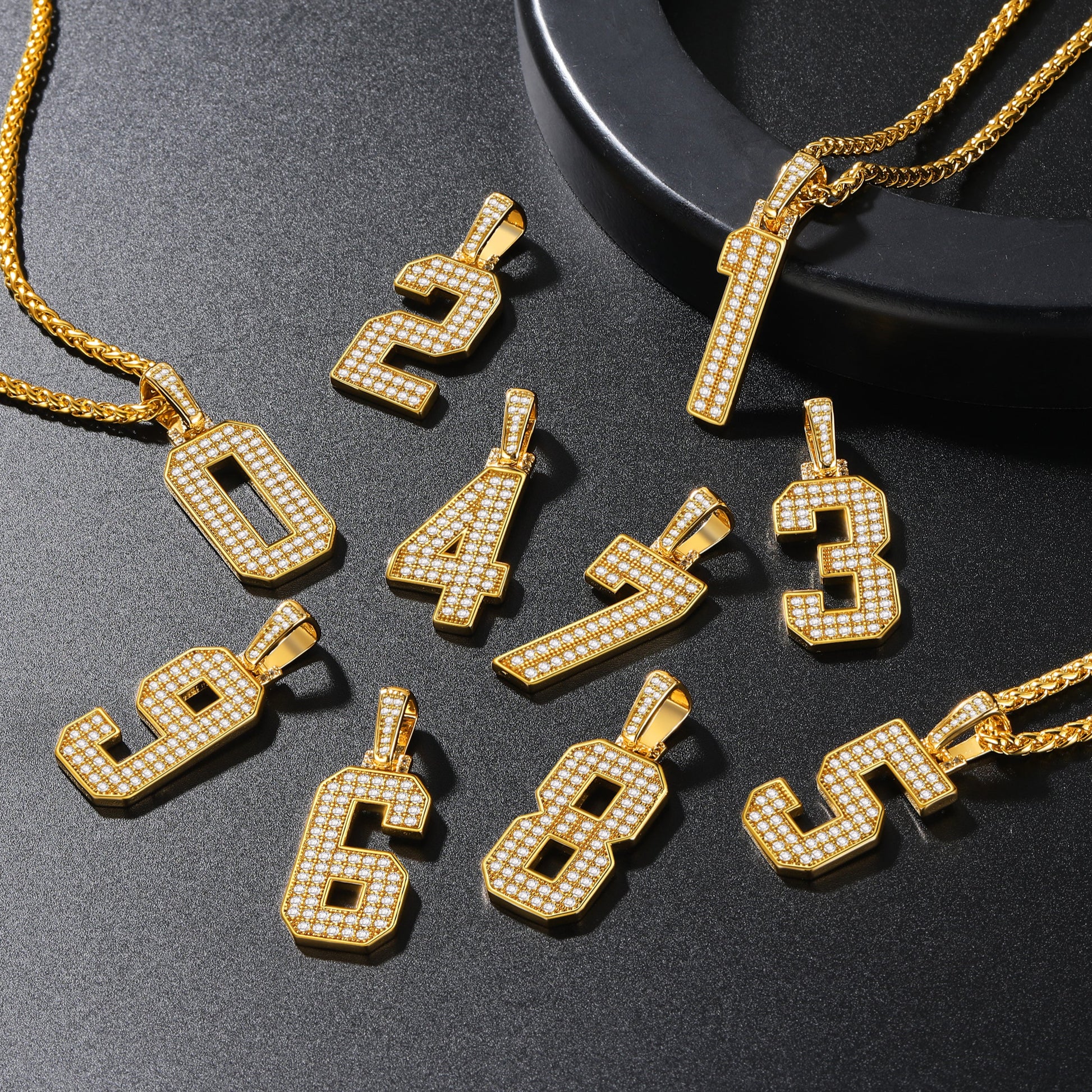 Gold number pendant necklace with cubic zirconia, multiple numbers displayed