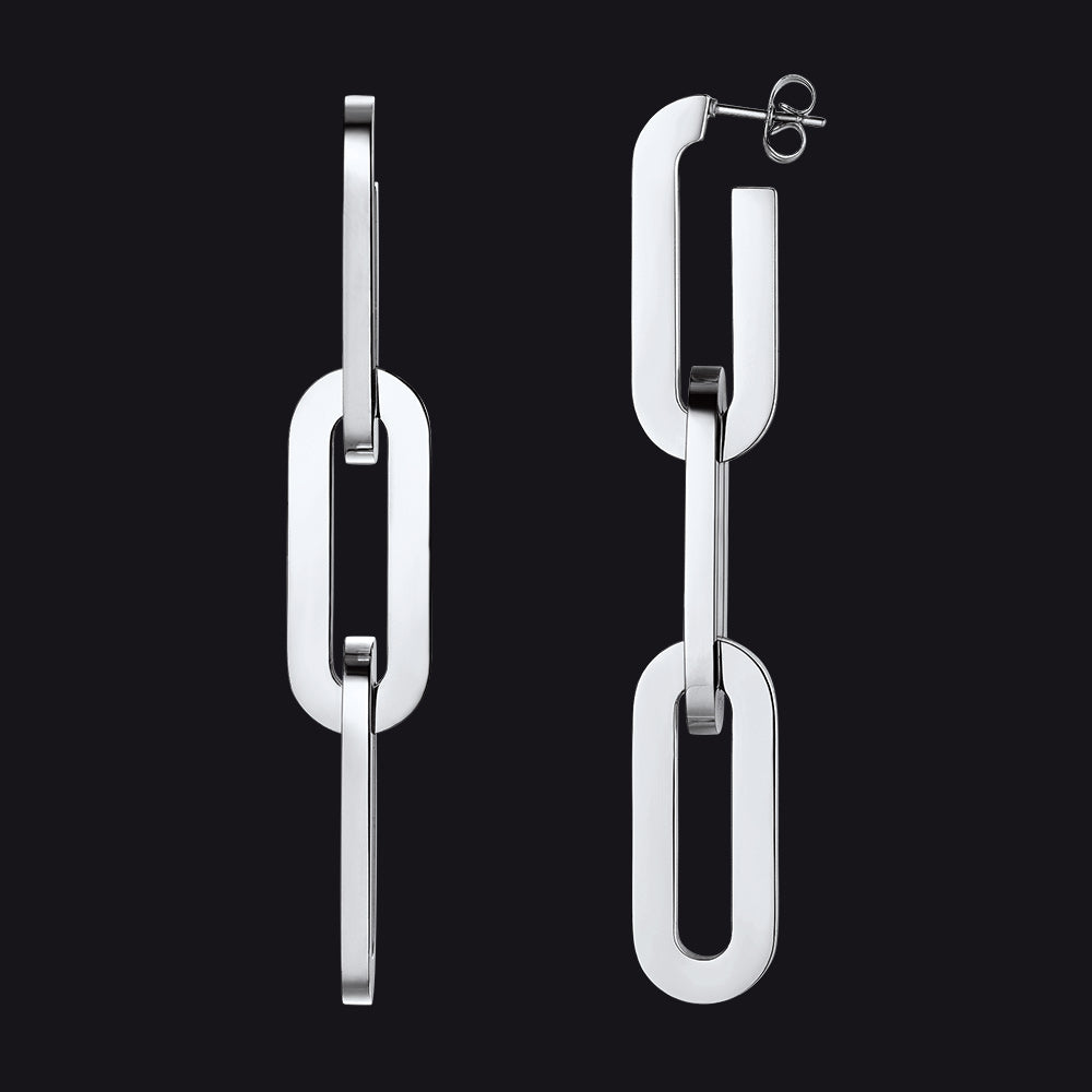 Pair of silver chain-link earrings on a black background
