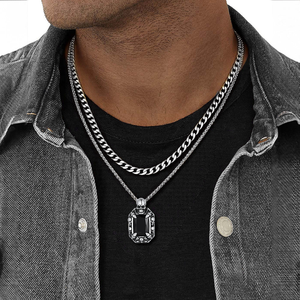 Male model wearing Gothic skull dragon claw crystal pendant with Cuban chain