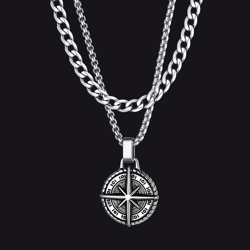 Stainless steel Cuban chain with detailed Polaris compass pendant for men.