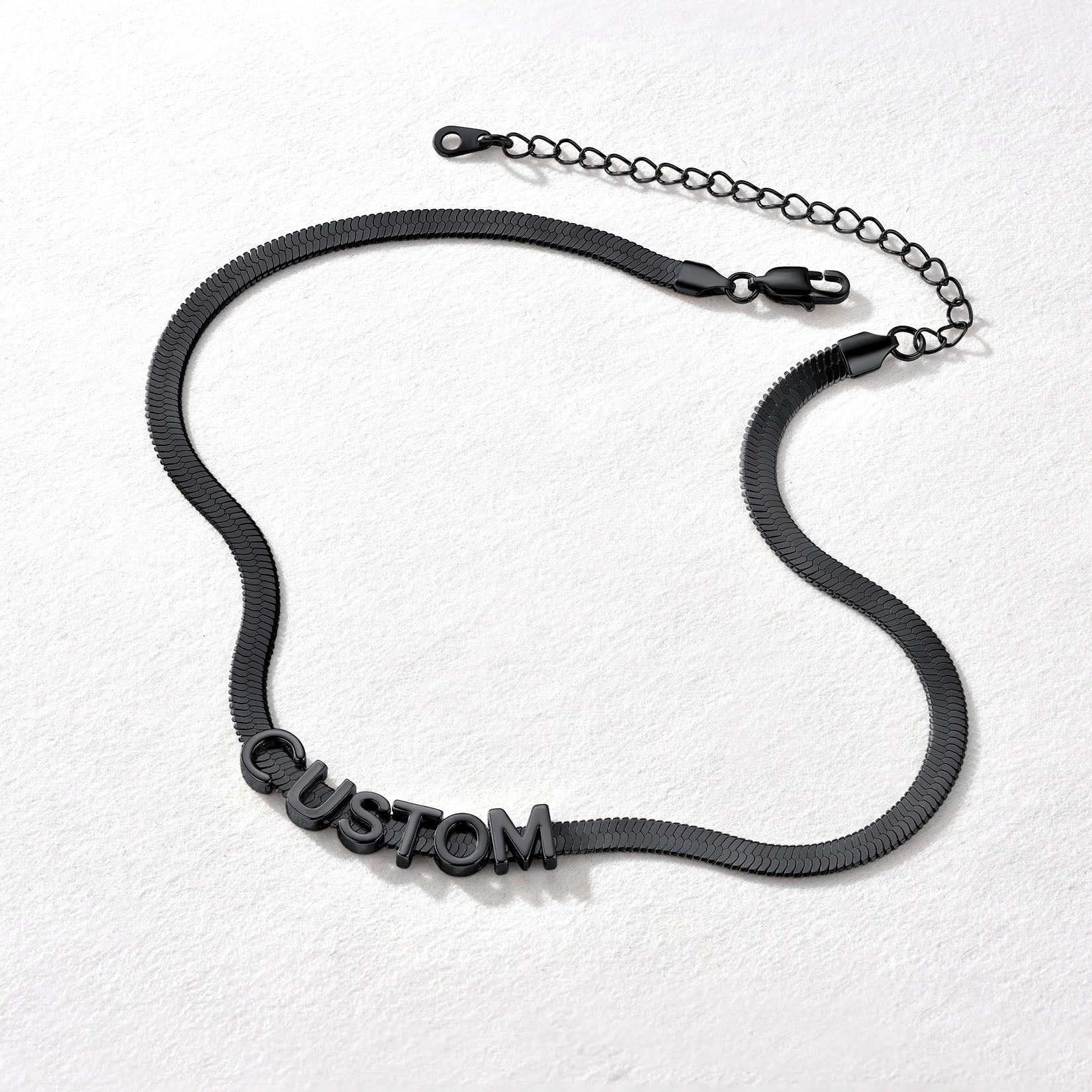 Close-up of engraved nameplate on 5MM choker chain