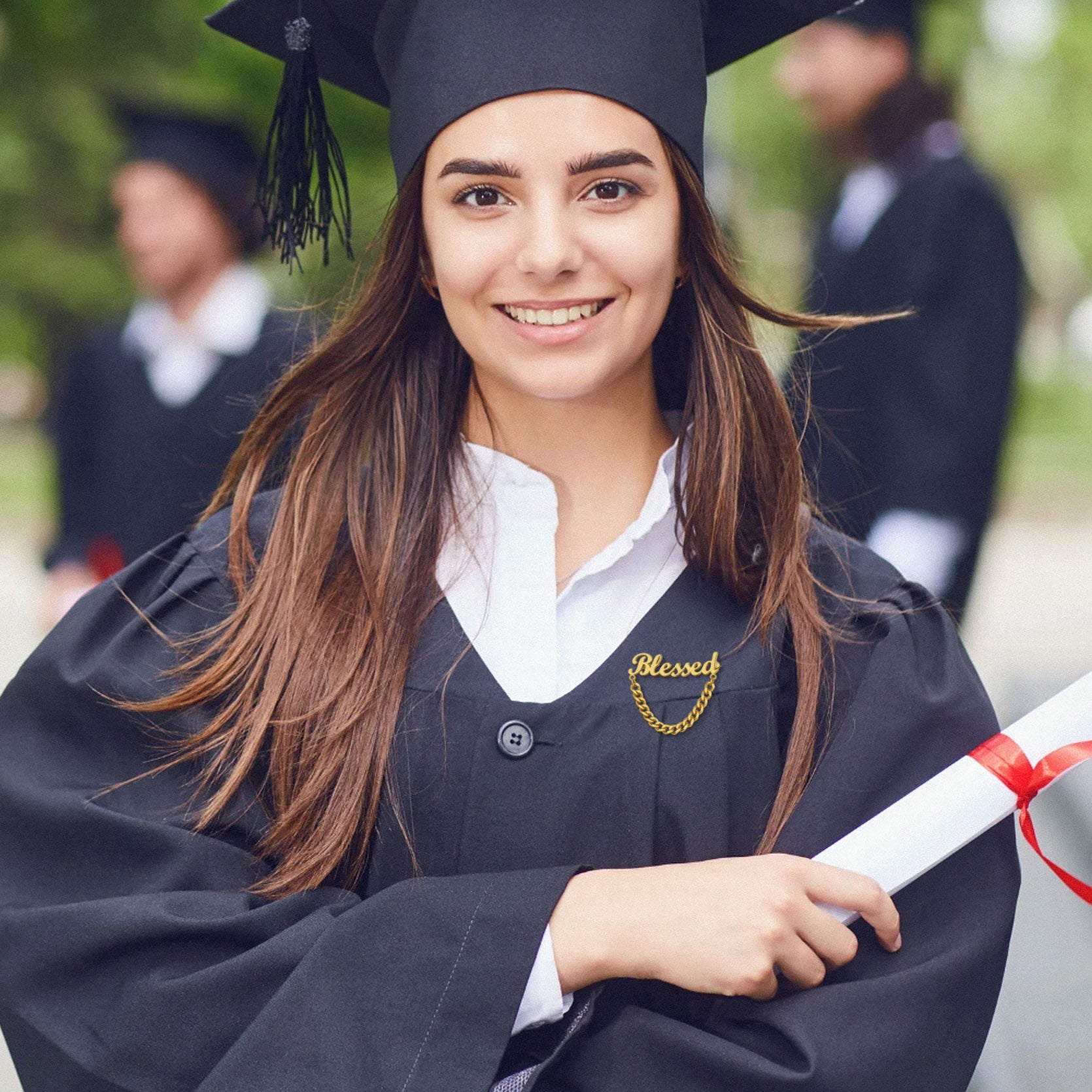Graduation Gift: Blessed brooch pin on a graduate's gown