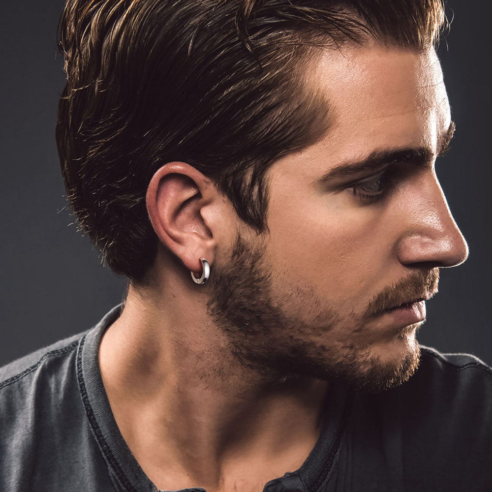 Man Wearing steel 9mm Huggie Hoops