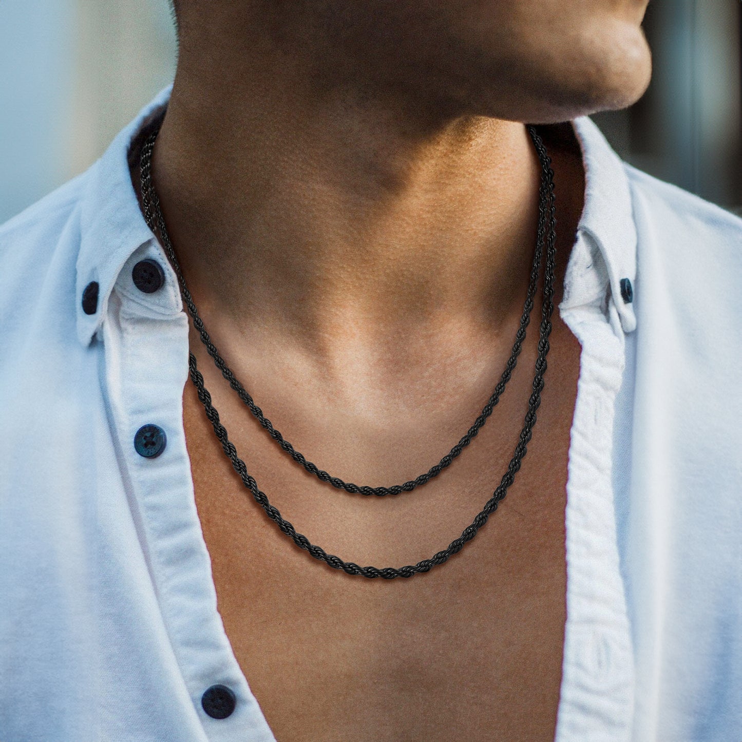 Person wearing 3MM & 6MM Layered Twisted Rope Link Chain Necklace Set