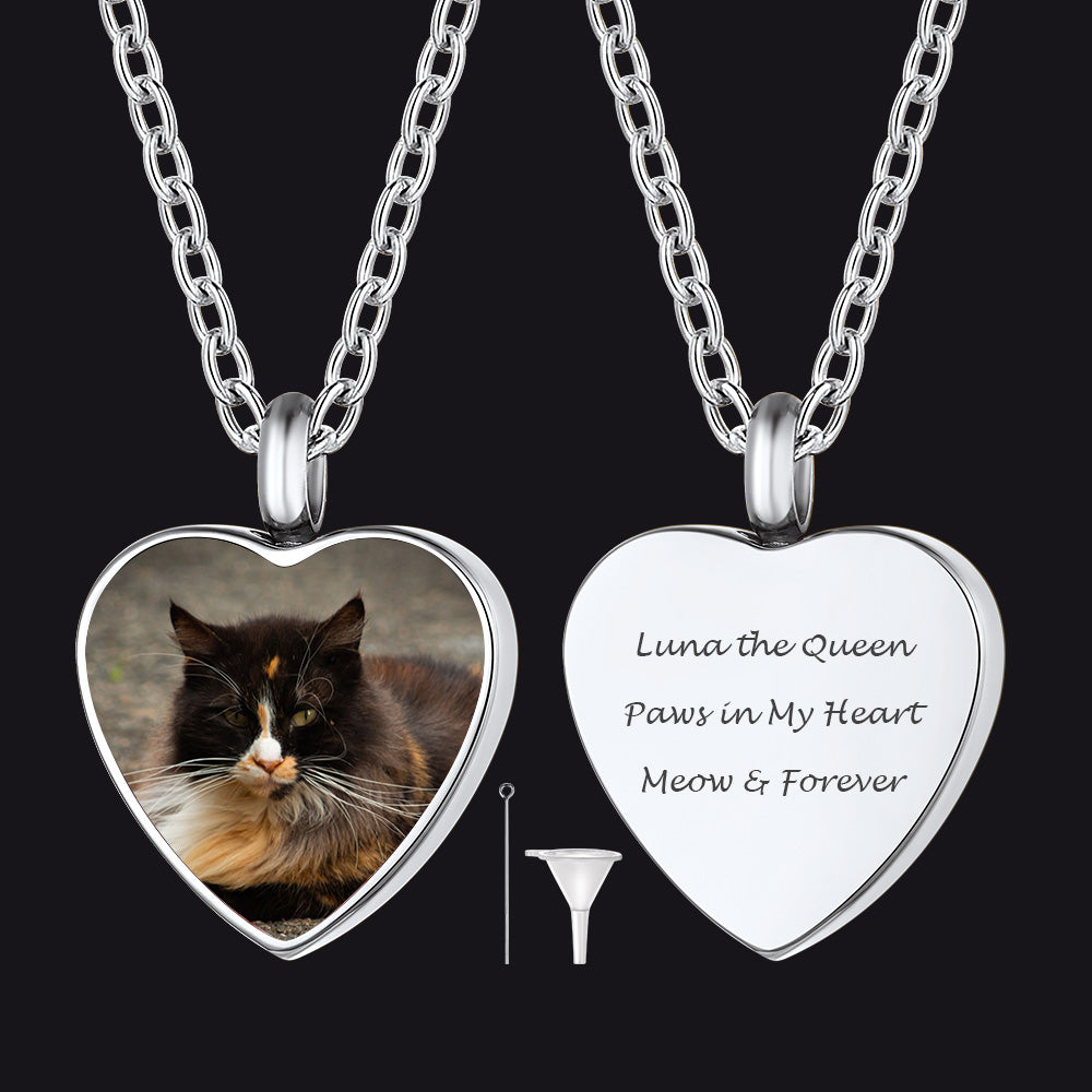 Heart-shaped pendant with a cat photo and engraved text