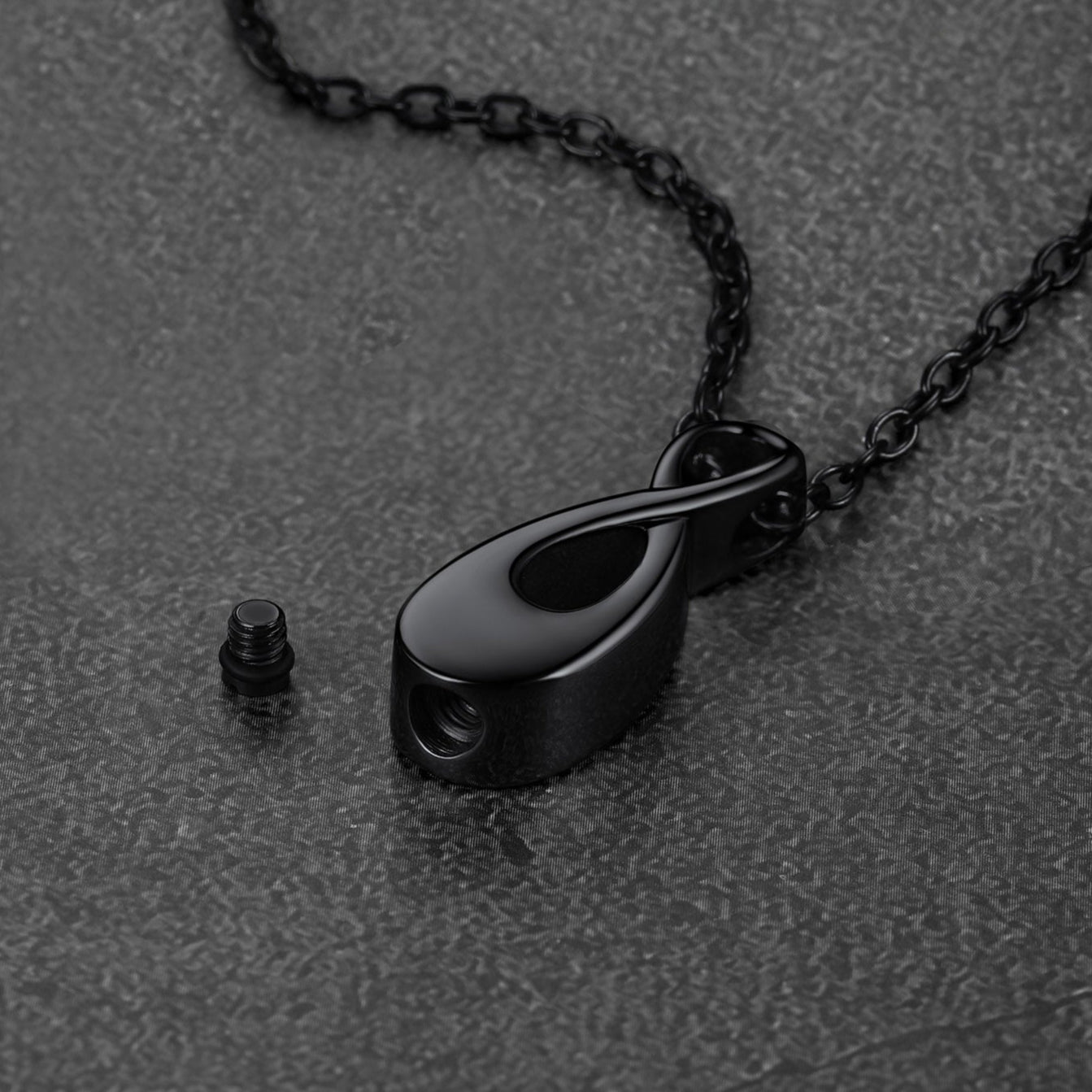 Close-up of Customized Infinity Urn Necklace Cremation Jewelry for Ashes FaithHeart Jewelry