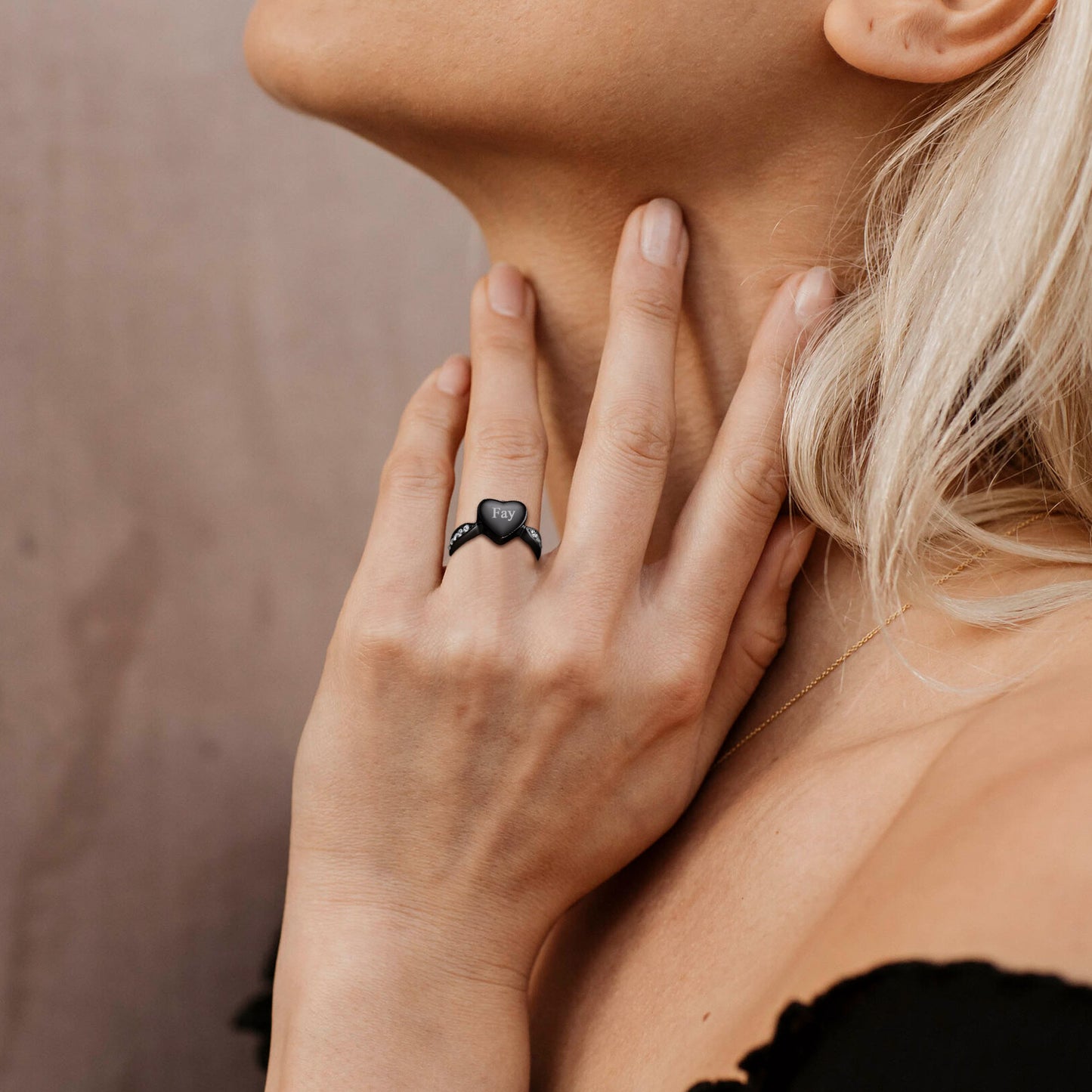 Close-Up of Black Cremation Ring on Hand